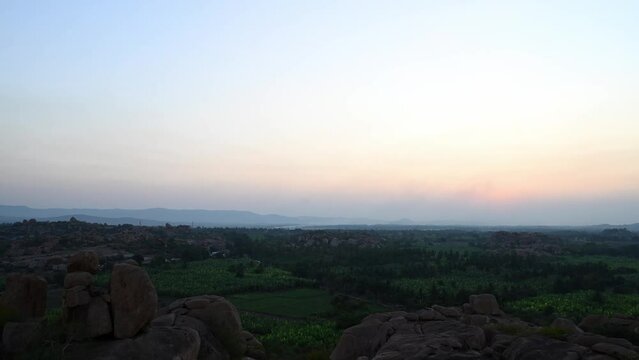 Time-lapse video of Sunset at Malayavanta Hill at Hampi Ruins Karnataka