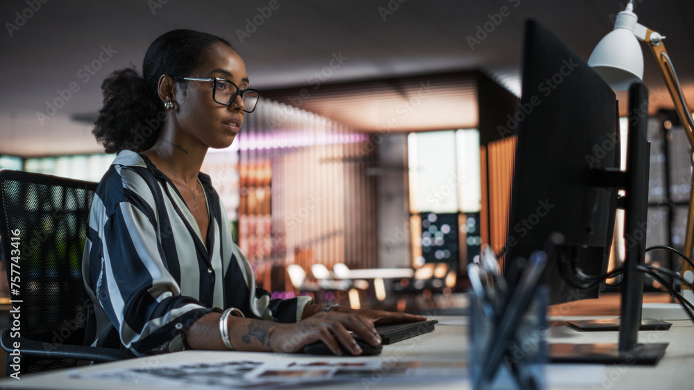 Poster portrait of a beautiful black woman using desktop computer, analysing data, thinking and solving pro