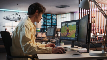 Caucasian Male Game Designer Using Desktop Computer With 3D Modeling Software To Design Unique...