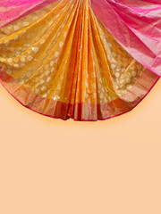 Indian traditional clothes saris Background, Close up of an Indian Saree design.