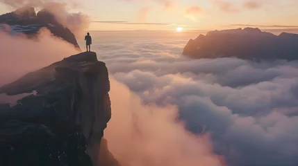 Fototapeten Traveler on cliff over clouds exploring sunset Segla mountain alone hiking adventure journey outdoor Norway vacations traveling lifestyle weekend getaway  © PSCL RDL
