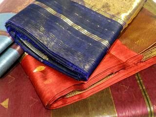 Close up of Colorful traditional Sari, saree displayed in India. natural silk, cotton fold fabric...