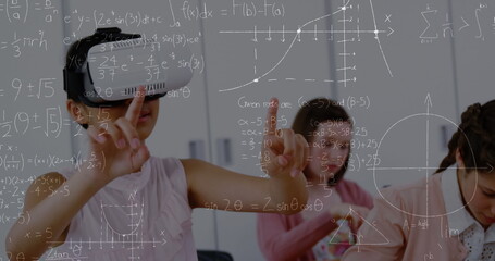 Image of mathematical equations over schoolchildren using vr headsets