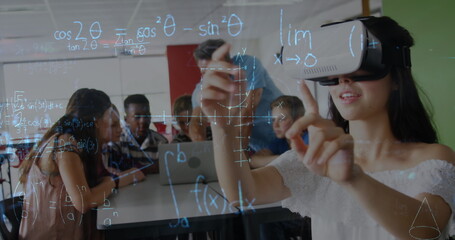 Image of mathematical equations over schoolchildren using vr headsets