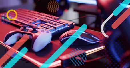 Image of neon lines over image game computer equipment