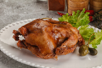 Baked small chicken with spices