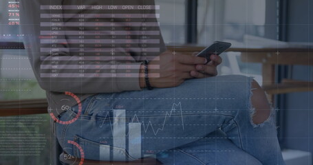 Image of statistics and data processing over man using smartphone