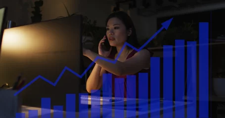 Fotobehang Aziatische plekken Image of financial data processing over asian businesswoman working in office