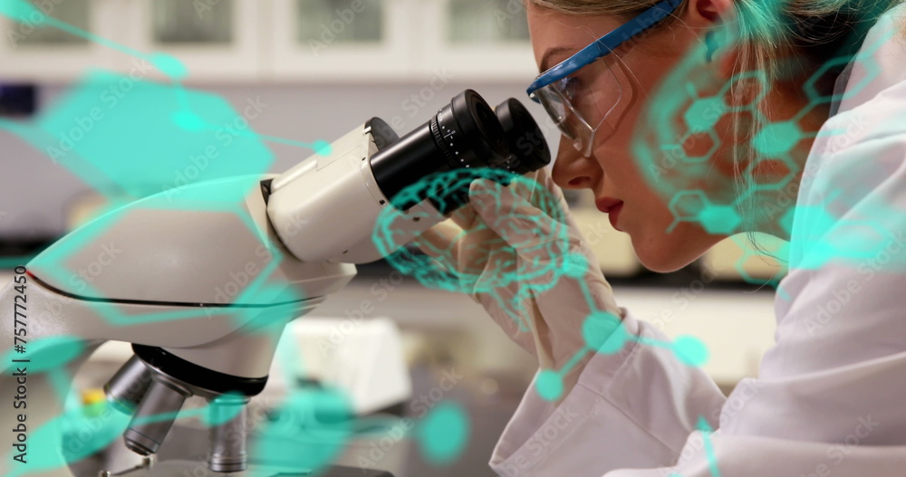 Poster image of scientific medical data and digital interface over female scientist using microscope in lab