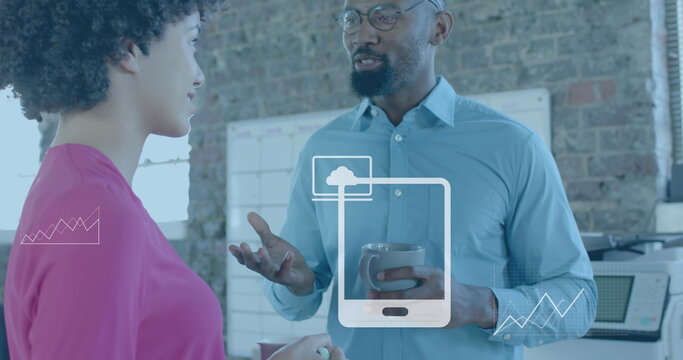 Image of media icons over diverse business people talking in office