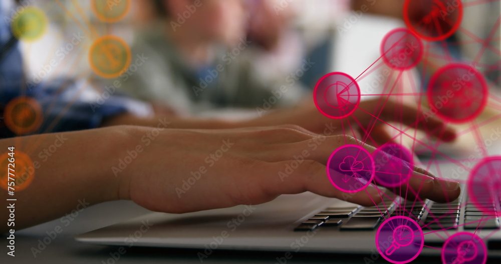 Poster digital interface with social media icons over a person using a laptop.