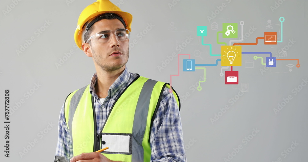 Poster digital interface with media icons overlays engineer noting on clipboard, symbolizing global network