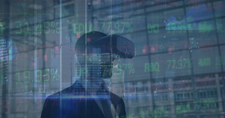 Image of data processing and caucasian businesswoman over caucasian businessman using vr headset