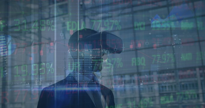 Image of data processing and caucasian businesswoman over caucasian businessman using vr headset