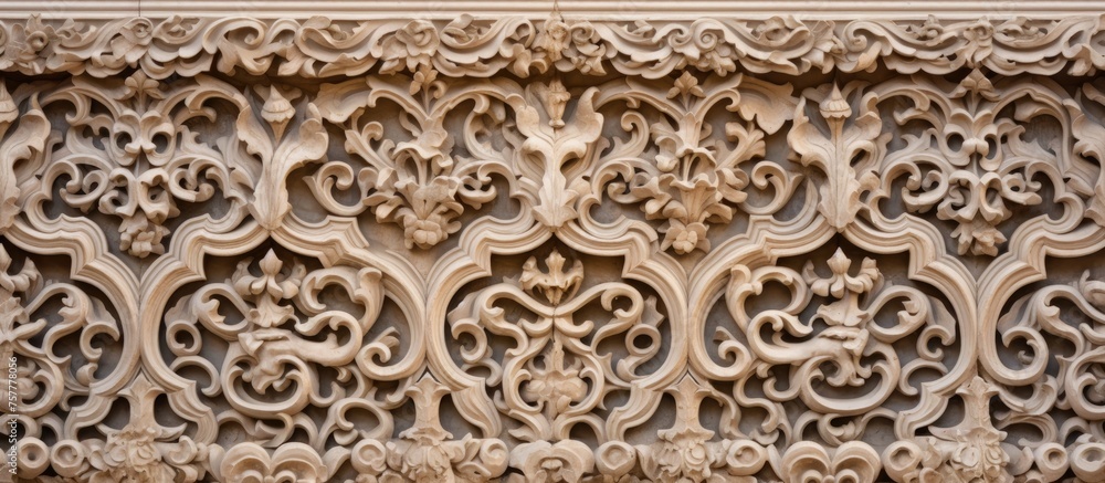 Poster a detailed stone carving with a symmetrical motif is displayed on a beige wall, showcasing ancient h
