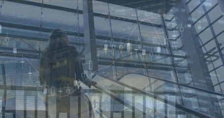 Image of data processing over caucasian businesswoman on stairs