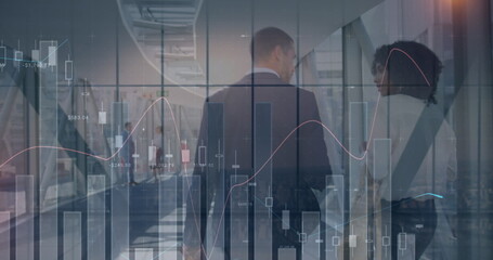 Image of financial data over back view of diverse businesswoman and businessman in office