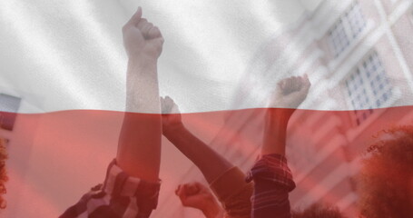 Image of flag of poland over hands of diverse protesters