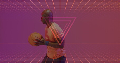 Image of neon pattern over african american basketball player