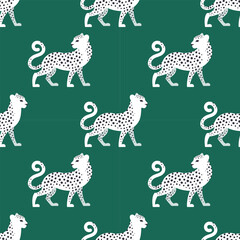 Modern seamless pattern with white spotted leopards on emerald background for textile, fabric, wallpaper, wrapping.