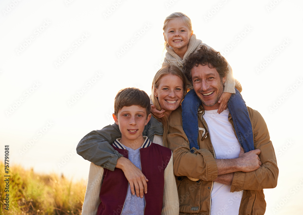 Poster Family, portrait and smile with field, walk and sunrise for morning exercise and bond. Parents, children and countryside for health, wellness and outdoor adventure at sunset for holiday or vacation.