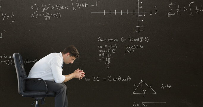 Disappointed man with math equations in dark background for back to school 4k image.