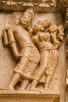 Stone carved sculpture on the outer wall of The Parshwanath temple, Adinath temple, Jain temple, Eastern group of temples, Khajuraho, Madhya Pradesh, India, Asia.