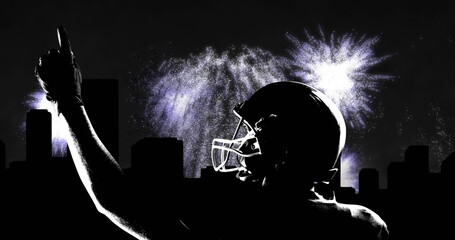 Image of cityscape and fireworks over male american football player pointing finger