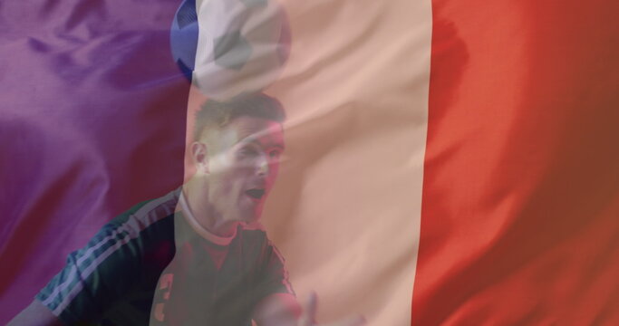 Image of caucasian male soccer player over flag of france - Powered by Adobe