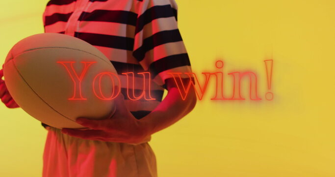 Image of you win text over female rugby player on neon background - Powered by Adobe