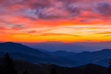 Fototapeta na wymiar sunset at mountain background