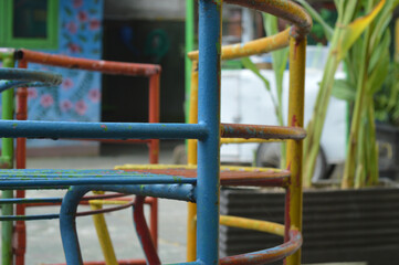 a toy or merry-go-round provided in a park or kindergarten for children to play with.