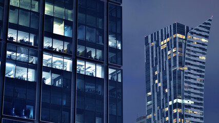 Office building at night, building facade with glass and lights. View with illuminated modern skyscraper. - 757818809
