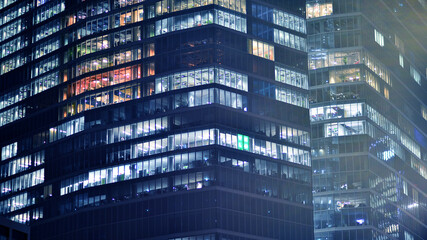 Office building at night, building facade with glass and lights. View with illuminated modern skyscraper. - 757821072