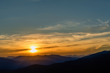 Fototapeta premium Sunset at mountain background