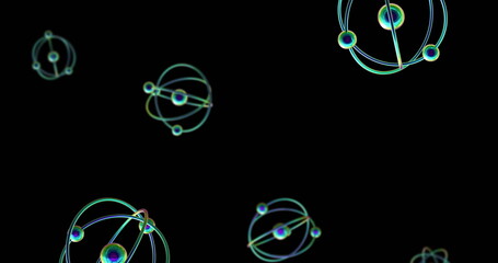Image of atom models spinning on black background