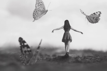 woman walking happily among giant butterflies dancing around her, abstract concept