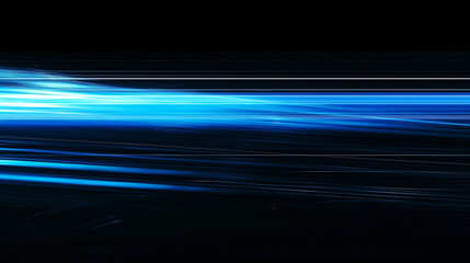 digitally generated image of blue light and stripes moving fast over black background.