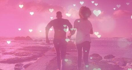 Image of heart icons over african american couple running