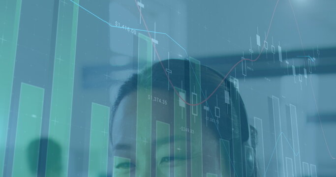 Image of financial data processing over asian businesswoman using phone headset in office