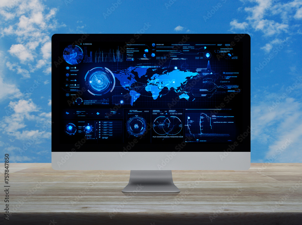 Poster computer with digital world map, data charts and stats screen on wooden table over blue sky with whi
