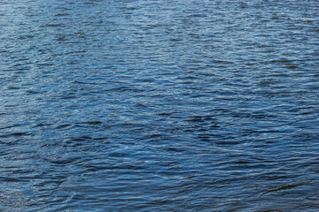 background. defocusing. reflection of the sky in a river lake