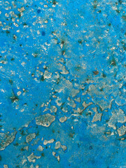 vivid blue metal surface with dust