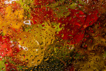 abstract background fall, glass drops autumn yellow leaves wet october weather