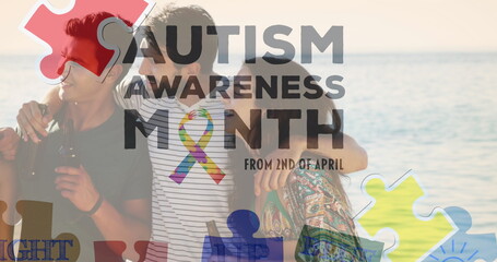 Image of colourful puzzle pieces and autism text over happy friends drinking beer at beach party