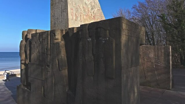 Drone captures Wedding Couple Monument with Sea in Kołobrzeg on a sunny day in February.