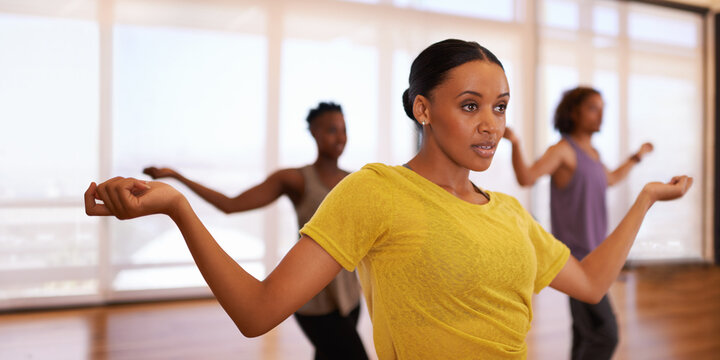 Dancer, woman and training for learning, exercise and fitness in a dance studio with movement routine. People and performance workout of woman with ballet and wellness in a performing arts class