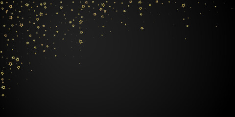 Gold sparkling star confetti.