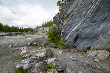 Italian marble quarry in Ruskeala mountain park - 757863486