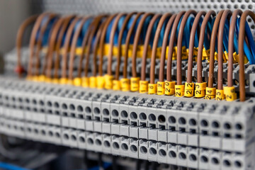 Electrical panel with fuses and contactors, close-up.